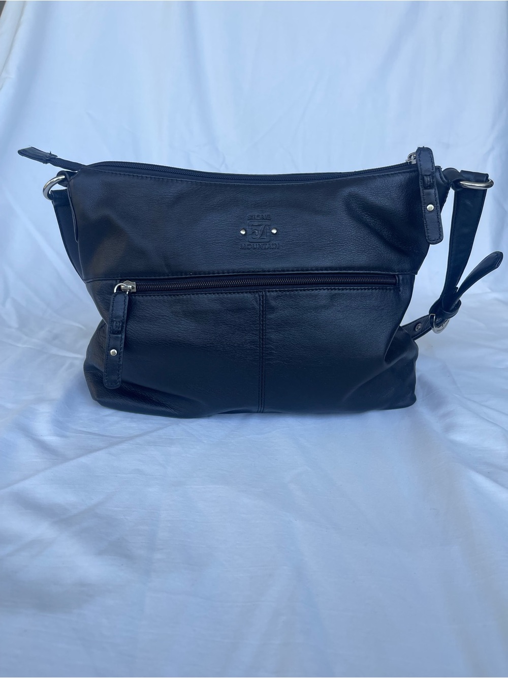 Stone Mountain Black Leather Crossbody Bag with Front Zip Pocket
